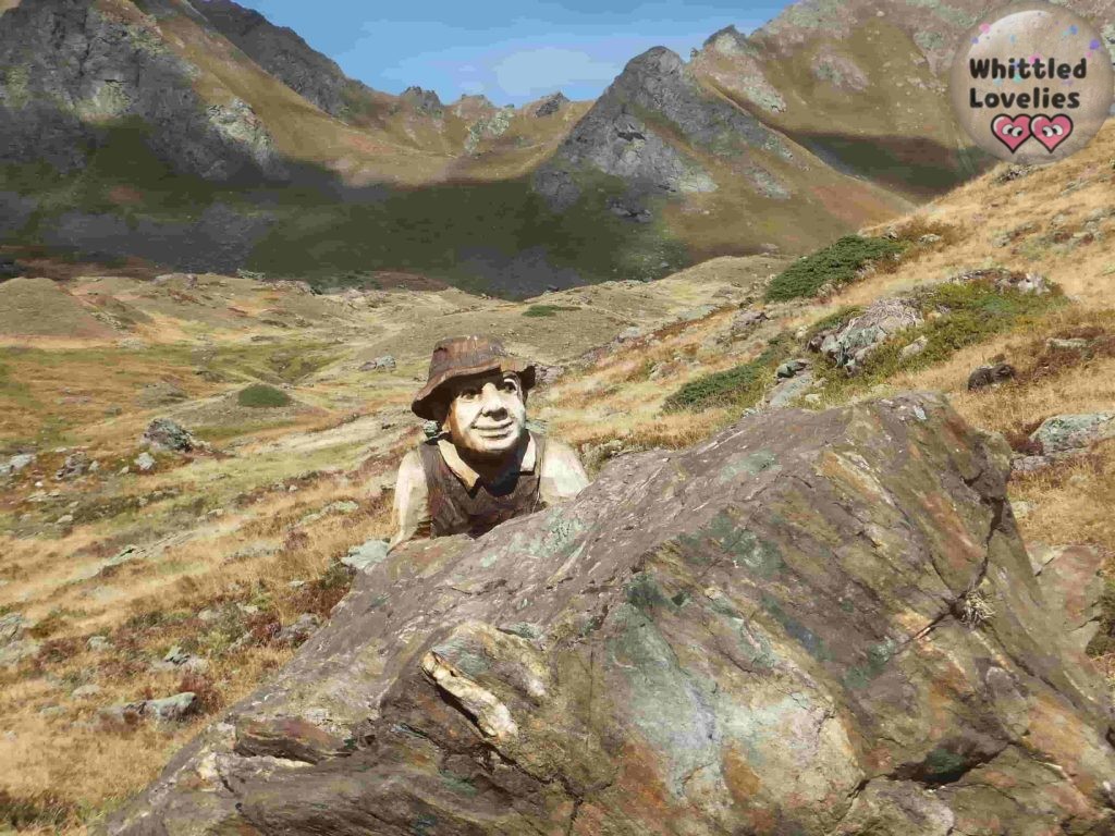the whittler does nott go on holiday - refuge mont fallere statue man with hat by Siro Vierin