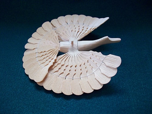L'arte del fan-carving - un fan-bird stile russo