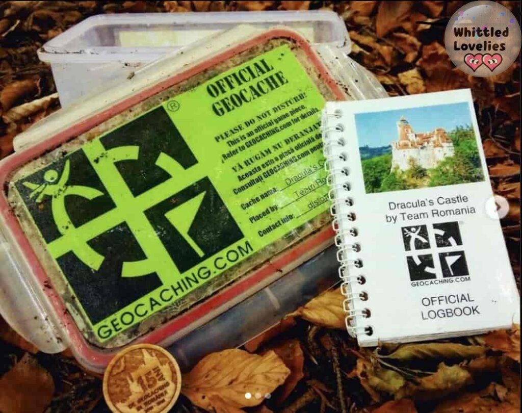 Photo of the hidden cache at Dracula's castle in Romania. The cache is open and you can see the logbook and a geocoin to exchange.